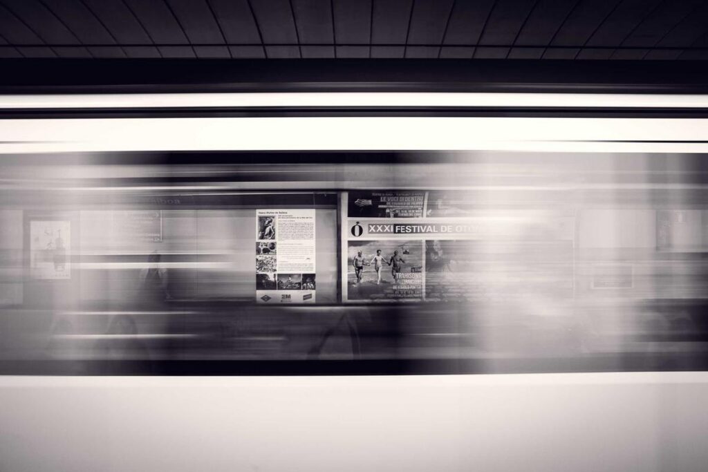 A person using a smartphone displaying various profitable mobile games, representing the best game apps that pay real money 2026.